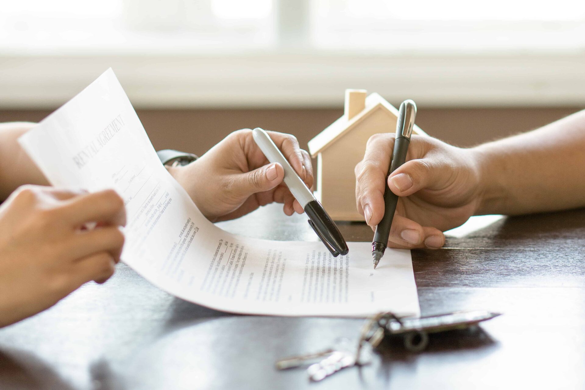 Adviser and client signing document together