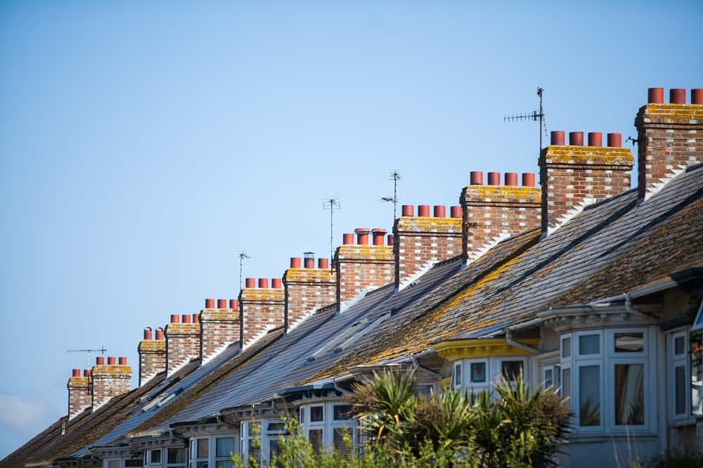 Houses in a row against a blue sky