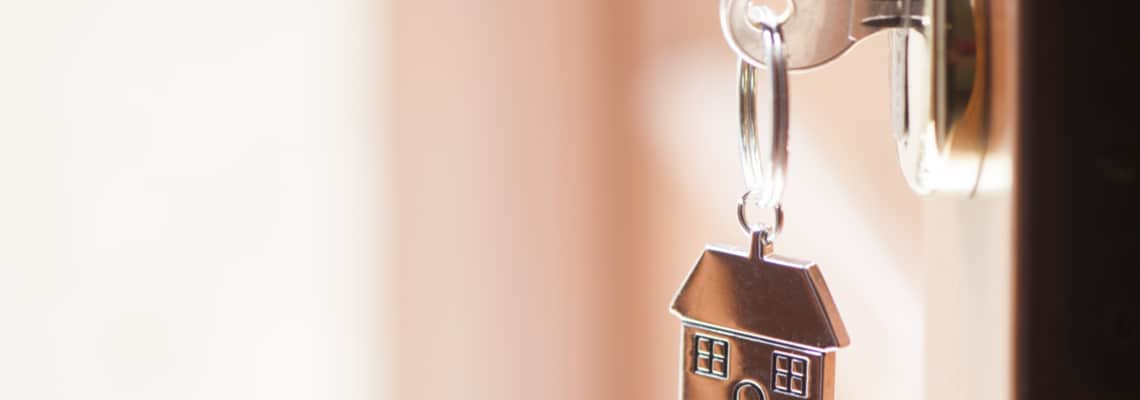 house keychain & key in lock
