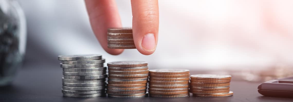 piles of pennies and small coins